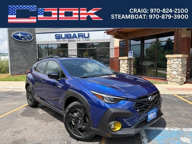 2026 Subaru CROSSTREK Sport Hybrid in Sapphire Blue Pearl — front three-quarter view